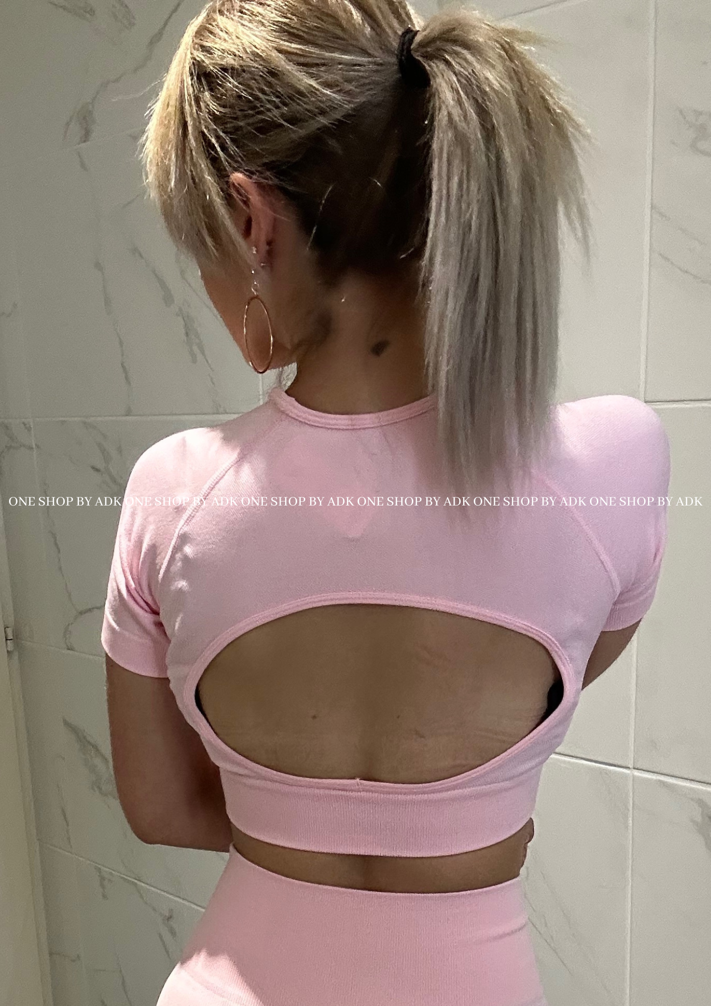 Ensemble legging et top de sport rose %